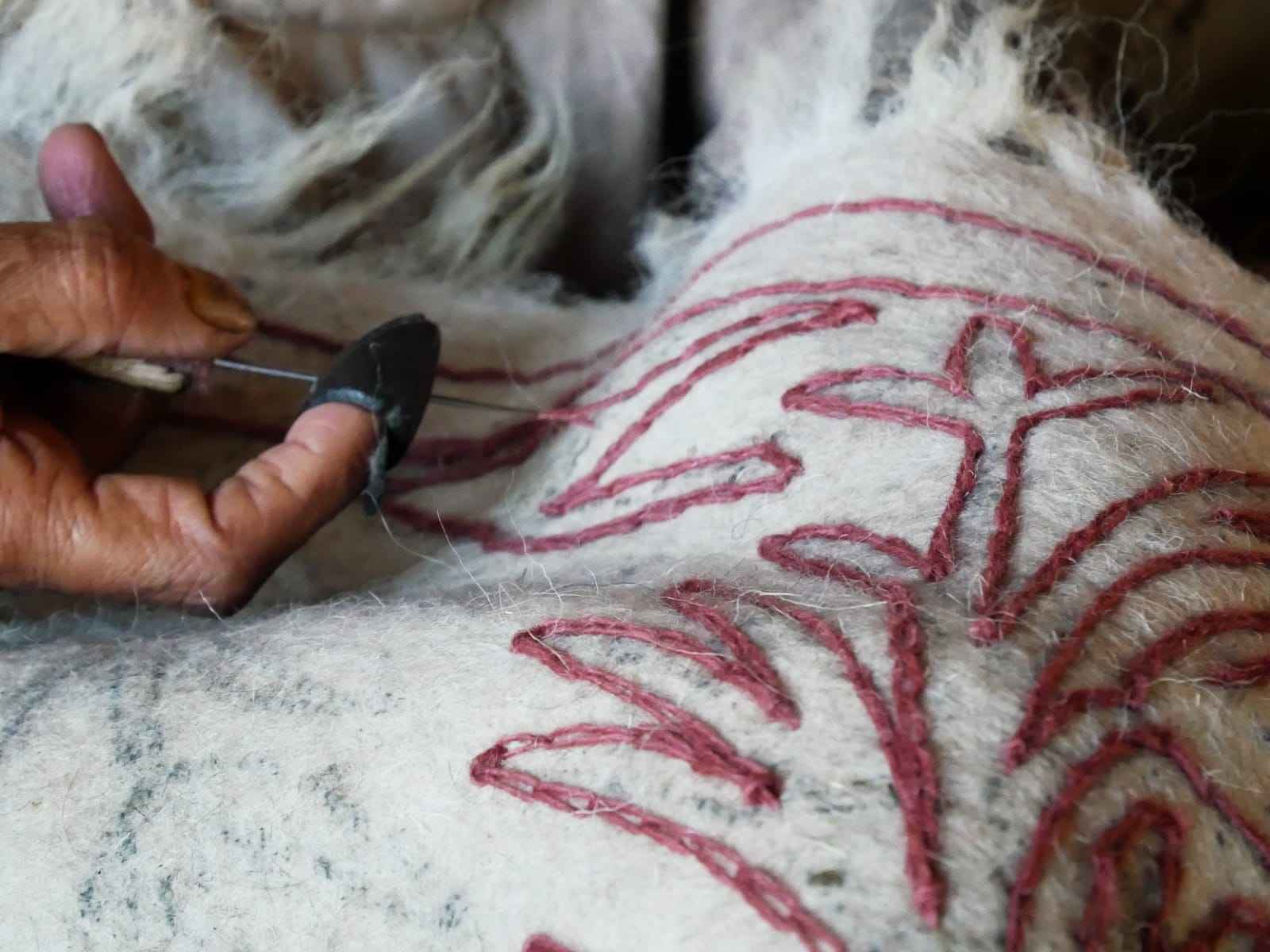 Hand-felted Kashmiri Namda rug with traditional floral embroidery – The Shanti Home